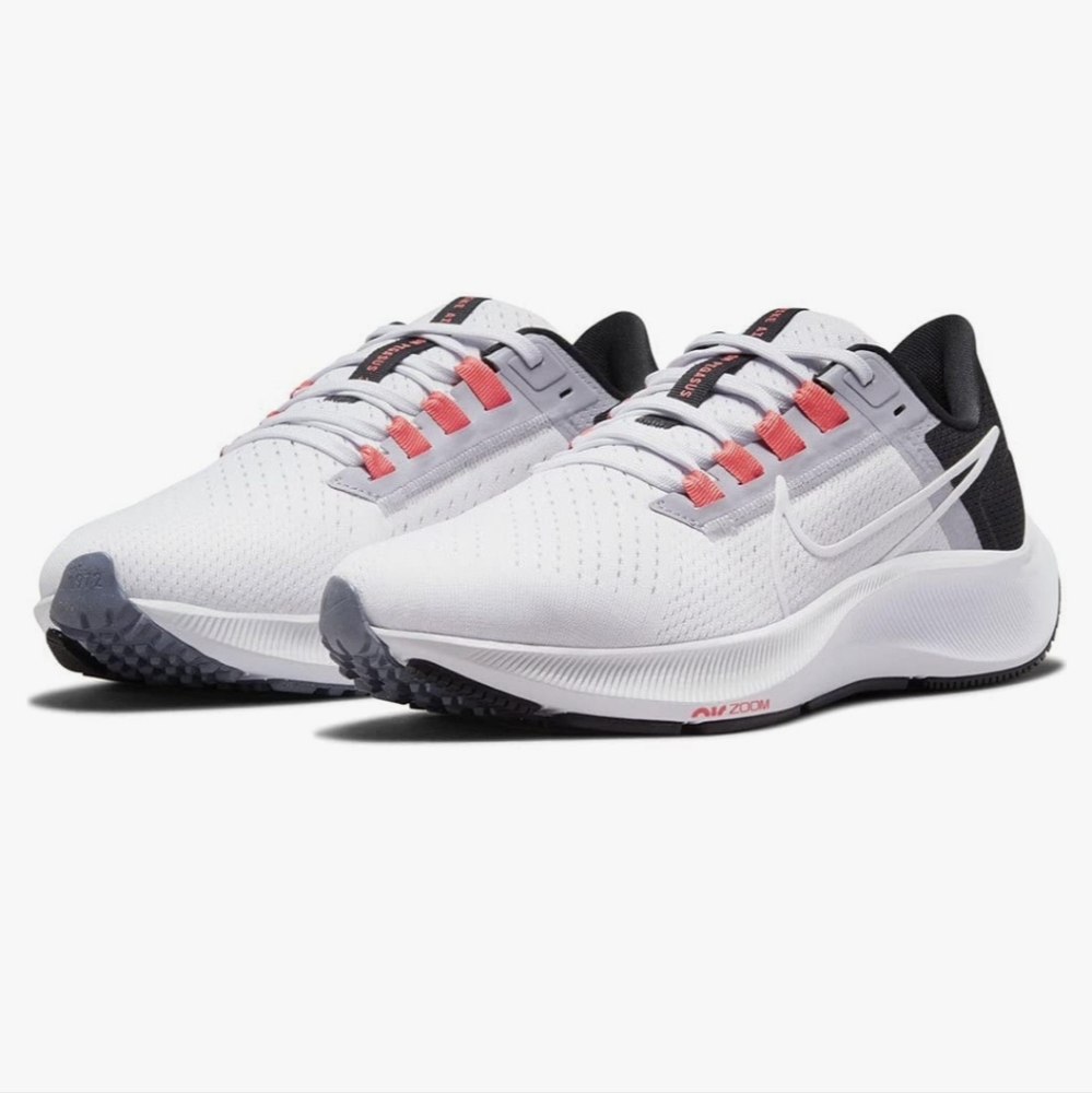 Nike air zoom pegasus 38 size 7 pink, white, and black.